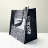 PP Woven Black White Reusable Shopping Bag with Notebook Design - K008